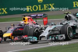 Nico Rosberg (GER), Mercedes AMG F1 Team and Sebastian Vettel (GER), Red Bull Racing  20.04.2014. Formula 1 World Championship, Rd 4, Chinese Grand Prix, Shanghai, China, Race Day.