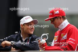 Valtteri Bottas (FIN), Williams F1 Team and Kimi Raikkonen (FIN), Scuderia Ferrari  20.04.2014. Formula 1 World Championship, Rd 4, Chinese Grand Prix, Shanghai, China, Race Day.