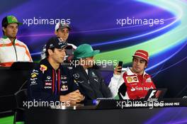 (L to R): Daniel Ricciardo (AUS) Red Bull Racing; Lewis Hamilton (GBR) Mercedes AMG F1 and Fernando Alonso (ESP) Ferrari in the FIA Press Conference. 17.04.2014. Formula 1 World Championship, Rd 4, Chinese Grand Prix, Shanghai, China, Preparation Day.