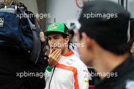 Sergio Perez (MEX) Sahara Force India F1 with the media. 17.04.2014. Formula 1 World Championship, Rd 4, Chinese Grand Prix, Shanghai, China, Preparation Day.