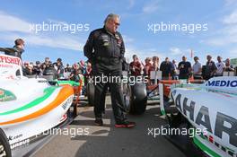 Dr. Vijay Mallya (IND) Sahara Force India F1 Team Owner with a collection of old Sahara Force India F1 Team cars. 04.07.2014. Formula 1 World Championship, Rd 9, British Grand Prix, Silverstone, England, Practice Day.