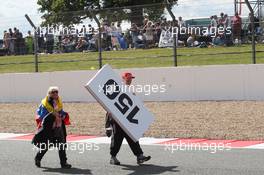A fan with a souvenir brake marker board. 06.07.2014. Formula 1 World Championship, Rd 9, British Grand Prix, Silverstone, England, Race Day.