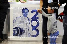 Felipe Massa (BRA) Williams celebrates his 200th GP with his son Felipinho Massa (BRA). 05.07.2014. Formula 1 World Championship, Rd 9, British Grand Prix, Silverstone, England, Qualifying Day.