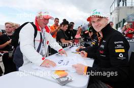 Nico Hulkenberg (GER) Sahara Force India F1 signs autographs for the fans. 05.07.2014. Formula 1 World Championship, Rd 9, British Grand Prix, Silverstone, England, Qualifying Day.