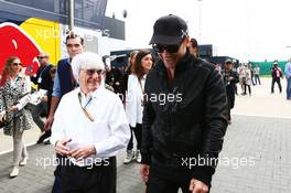 (L to R): Bernie Ecclestone (GBR) with Jude Law (GBR) Actor. 06.07.2014. Formula 1 World Championship, Rd 9, British Grand Prix, Silverstone, England, Race Day.
