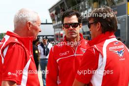 (L to R): John Booth (GBR) Marussia F1 Team Team Principal with Marc Hynes (GBR) Marussia F1 Team Driver Coach and Graeme Lowdon (GBR) Marussia F1 Team Chief Executive Officer. 06.07.2014. Formula 1 World Championship, Rd 9, British Grand Prix, Silverstone, England, Race Day.