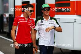 (L to R): Jules Bianchi (FRA) Marussia F1 Team with Marcus Ericsson (SWE) Caterham. 25.07.2014. Formula 1 World Championship, Rd 11, Hungarian Grand Prix, Budapest, Hungary, Practice Day.