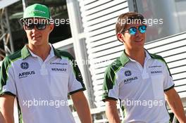 (L to R): Marcus Ericsson (SWE) Caterham with team mate Kamui Kobayashi (JPN) Caterham. 25.07.2014. Formula 1 World Championship, Rd 11, Hungarian Grand Prix, Budapest, Hungary, Practice Day.