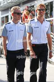 (L to R): Kevin Magnussen (DEN) McLaren with Jenson Button (GBR) McLaren. 25.07.2014. Formula 1 World Championship, Rd 11, Hungarian Grand Prix, Budapest, Hungary, Practice Day.
