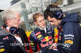(L to R): Dr Helmut Marko (AUT) Red Bull Motorsport Consultant with Sebastian Vettel (GER) Red Bull Racing and Guillaume Rocquelin (ITA) Red Bull Racing Race Engineer on the grid. 27.07.2014. Formula 1 World Championship, Rd 11, Hungarian Grand Prix, Budapest, Hungary, Race Day.