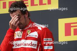 Second placed Fernando Alonso (ESP) Ferrari on the podium. 27.07.2014. Formula 1 World Championship, Rd 11, Hungarian Grand Prix, Budapest, Hungary, Race Day.