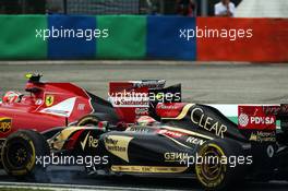 Pastor Maldonado (VEN) Lotus F1 E21 and Kimi Raikkonen (FIN) Ferrari F14-T battle for position. 27.07.2014. Formula 1 World Championship, Rd 11, Hungarian Grand Prix, Budapest, Hungary, Race Day.