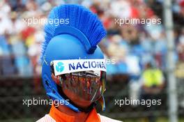 A marshal with a mohican Ayrton Senna themed  helmet. 27.07.2014. Formula 1 World Championship, Rd 11, Hungarian Grand Prix, Budapest, Hungary, Race Day.