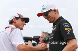 (L to R): Adrian Sutil (GER) Sauber and Nico Hulkenberg (GER) Sahara Force India F1 on the drivers parade. 27.07.2014. Formula 1 World Championship, Rd 11, Hungarian Grand Prix, Budapest, Hungary, Race Day.
