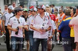 (L to R): Nico Rosberg (GER) Mercedes AMG F1 and Adrian Sutil (GER) Sauber on the drivers parade. 27.07.2014. Formula 1 World Championship, Rd 11, Hungarian Grand Prix, Budapest, Hungary, Race Day.