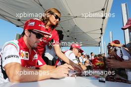 Fernando Alonso (ESP) Ferrari signs autographs for the fans. 24.07.2014. Formula 1 World Championship, Rd 11, Hungarian Grand Prix, Budapest, Hungary, Preparation Day.