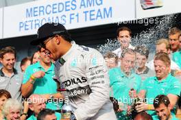 Race winner Nico Rosberg (GER) Mercedes AMG F1 celebrates with the team. 07.09.2014. Formula 1 World Championship, Rd 13, Italian Grand Prix, Monza, Italy, Race Day.
