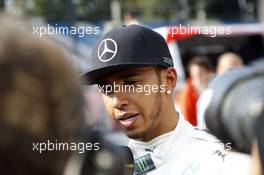 Lewis Hamilton (GBR) Mercedes AMG F1 with the media. 07.09.2014. Formula 1 World Championship, Rd 13, Italian Grand Prix, Monza, Italy, Race Day.