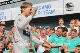 Nico Rosberg (GER) Mercedes AMG F1 celebrates a 1-2 finish with the team. 07.09.2014. Formula 1 World Championship, Rd 13, Italian Grand Prix, Monza, Italy, Race Day.