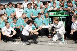 Nico Rosberg (GER) Mercedes AMG F1 celebrates his second position with Toto Wolff (GER) Mercedes AMG F1 Shareholder and Executive Director and the team. 07.09.2014. Formula 1 World Championship, Rd 13, Italian Grand Prix, Monza, Italy, Race Day.
