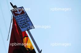 A fan with a flag to sign at the podium. 07.09.2014. Formula 1 World Championship, Rd 13, Italian Grand Prix, Monza, Italy, Race Day.