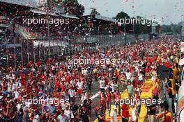 Fans invade the podium at the end of the race. 07.09.2014. Formula 1 World Championship, Rd 13, Italian Grand Prix, Monza, Italy, Race Day.