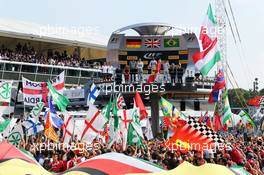The podium (L to R): Nico Rosberg (GER) Mercedes AMG F1, second; Lewis Hamilton (GBR) Mercedes AMG F1, race winner; Felipe Massa (BRA) Williams, third. 07.09.2014. Formula 1 World Championship, Rd 13, Italian Grand Prix, Monza, Italy, Race Day.