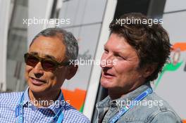 (L to R): Hiroshi Yasukawa (JPN) Dorna Sports Adviser with Guido Pozzi (ITA). 06.09.2014. Formula 1 World Championship, Rd 13, Italian Grand Prix, Monza, Italy, Qualifying Day.