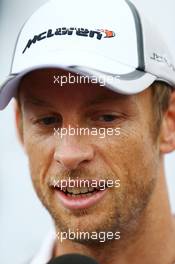 Jenson Button (GBR) McLaren with the media. 04.09.2014. Formula 1 World Championship, Rd 13, Italian Grand Prix, Monza, Italy, Preparation Day.