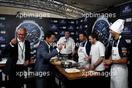 Casio Edifice Launch at RedBull Engery Station, Harald Schröder, General Division Manager, Marketing Section, Casio Europe, Christian Horner (GBR) Red Bull Racing Team Principal, Tom Sellers, Michelin-star chef and Daniel Ricciardo (AUS) Red Bull Racing. 04.09.2014. Formula 1 World Championship, Rd 13, Italian Grand Prix, Monza, Italy, Preparation Day.