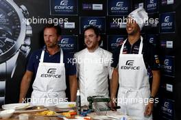 Casio Edifice Launch at RedBull Engery Station, Christian Horner (GBR) Red Bull Racing Team Principal with Tom Sellers, Michelin-star chef and Daniel Ricciardo (AUS) Red Bull Racing. 04.09.2014. Formula 1 World Championship, Rd 13, Italian Grand Prix, Monza, Italy, Preparation Day.