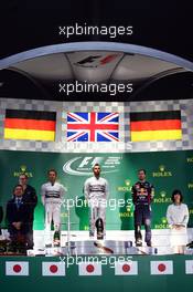 The podium (L to R): Nico Rosberg (GER) Mercedes AMG F1, second; Lewis Hamilton (GBR) Mercedes AMG F1, race winner; Sebastian Vettel (GER) Red Bull Racing, third. 05.10.2014. Formula 1 World Championship, Rd 15, Japanese Grand Prix, Suzuka, Japan, Race Day.