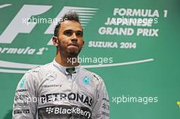 Race winner Lewis Hamilton (GBR) Mercedes AMG F1 on the podium. 05.10.2014. Formula 1 World Championship, Rd 15, Japanese Grand Prix, Suzuka, Japan, Race Day.