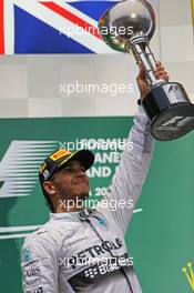 Race winner Lewis Hamilton (GBR) Mercedes AMG F1 celebrates on the podium. 05.10.2014. Formula 1 World Championship, Rd 15, Japanese Grand Prix, Suzuka, Japan, Race Day.
