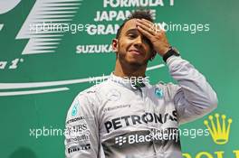 Race winner Lewis Hamilton (GBR) Mercedes AMG F1 on the podium. 05.10.2014. Formula 1 World Championship, Rd 15, Japanese Grand Prix, Suzuka, Japan, Race Day.