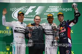 1st place for Lewis Hamilton (GBR) Mercedes AMG F1, 2nd for Nico Rosberg (GER) Mercedes AMG F1 W05 and 3rd for Sebastian Vettel (GER) Red Bull Racing.  05.10.2014. Formula 1 World Championship, Rd 15, Japanese Grand Prix, Suzuka, Japan, Race Day.