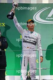 Nico Rosberg (GER) Mercedes AMG F1 celebrates his second position on the podium. 05.10.2014. Formula 1 World Championship, Rd 15, Japanese Grand Prix, Suzuka, Japan, Race Day.
