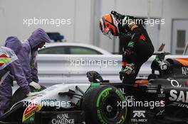 Nico Hulkenberg (GER) Sahara Force India F1 VJM07 stopped at the pit lane exit. 05.10.2014. Formula 1 World Championship, Rd 15, Japanese Grand Prix, Suzuka, Japan, Race Day.