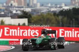 Kamui Kobayashi (JPN) Caterham CT05 waves to the fans. 04.10.2014. Formula 1 World Championship, Rd 15, Japanese Grand Prix, Suzuka, Japan, Qualifying Day.