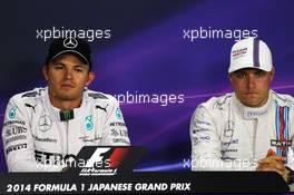 (L to R): Nico Rosberg (GER) Mercedes AMG F1 and Valtteri Bottas (FIN) Williams in the FIA Press Conference. 04.10.2014. Formula 1 World Championship, Rd 15, Japanese Grand Prix, Suzuka, Japan, Qualifying Day.