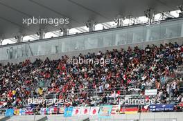 Fans in the grandstand and banners for the drivers. 02.10.2014. Formula 1 World Championship, Rd 15, Japanese Grand Prix, Suzuka, Japan, Preparation Day.