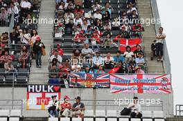 Fans in the grandstand and banners for the drivers. 02.10.2014. Formula 1 World Championship, Rd 15, Japanese Grand Prix, Suzuka, Japan, Preparation Day.