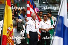 A minute's silence is observed on the grid for the victims of flight MH370. 30.03.2014. Formula 1 World Championship, Rd 2, Malaysian Grand Prix, Sepang, Malaysia, Sunday.