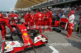 Fernando Alonso (ESP) Ferrari F14-T on the grid. 30.03.2014. Formula 1 World Championship, Rd 2, Malaysian Grand Prix, Sepang, Malaysia, Sunday.