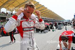 Max Chilton (GBR) Marussia F1 Team on the grid. 30.03.2014. Formula 1 World Championship, Rd 2, Malaysian Grand Prix, Sepang, Malaysia, Sunday.