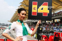 Grid girl. 30.03.2014. Formula 1 World Championship, Rd 2, Malaysian Grand Prix, Sepang, Malaysia, Sunday.