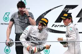 Lewis Hamilton (GBR), Mercedes AMG F1 Team and Nico Rosberg (GER), Mercedes AMG F1 Team  30.03.2014. Formula 1 World Championship, Rd 2, Malaysian Grand Prix, Sepang, Malaysia, Sunday.