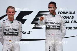 Nico Rosberg (GER), Mercedes AMG F1 Team and Lewis Hamilton (GBR), Mercedes AMG F1 Team  30.03.2014. Formula 1 World Championship, Rd 2, Malaysian Grand Prix, Sepang, Malaysia, Sunday.