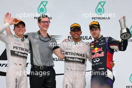 Nico Rosberg (GER), Mercedes AMG F1 Team, Lewis Hamilton (GBR), Mercedes AMG F1 Team and Sebastian Vettel (GER), Red Bull Racing  30.03.2014. Formula 1 World Championship, Rd 2, Malaysian Grand Prix, Sepang, Malaysia, Sunday.