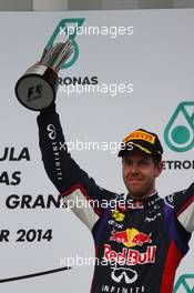 3rd place Sebastian Vettel (GER) Red Bull Racing. 30.03.2014. Formula 1 World Championship, Rd 2, Malaysian Grand Prix, Sepang, Malaysia, Sunday.